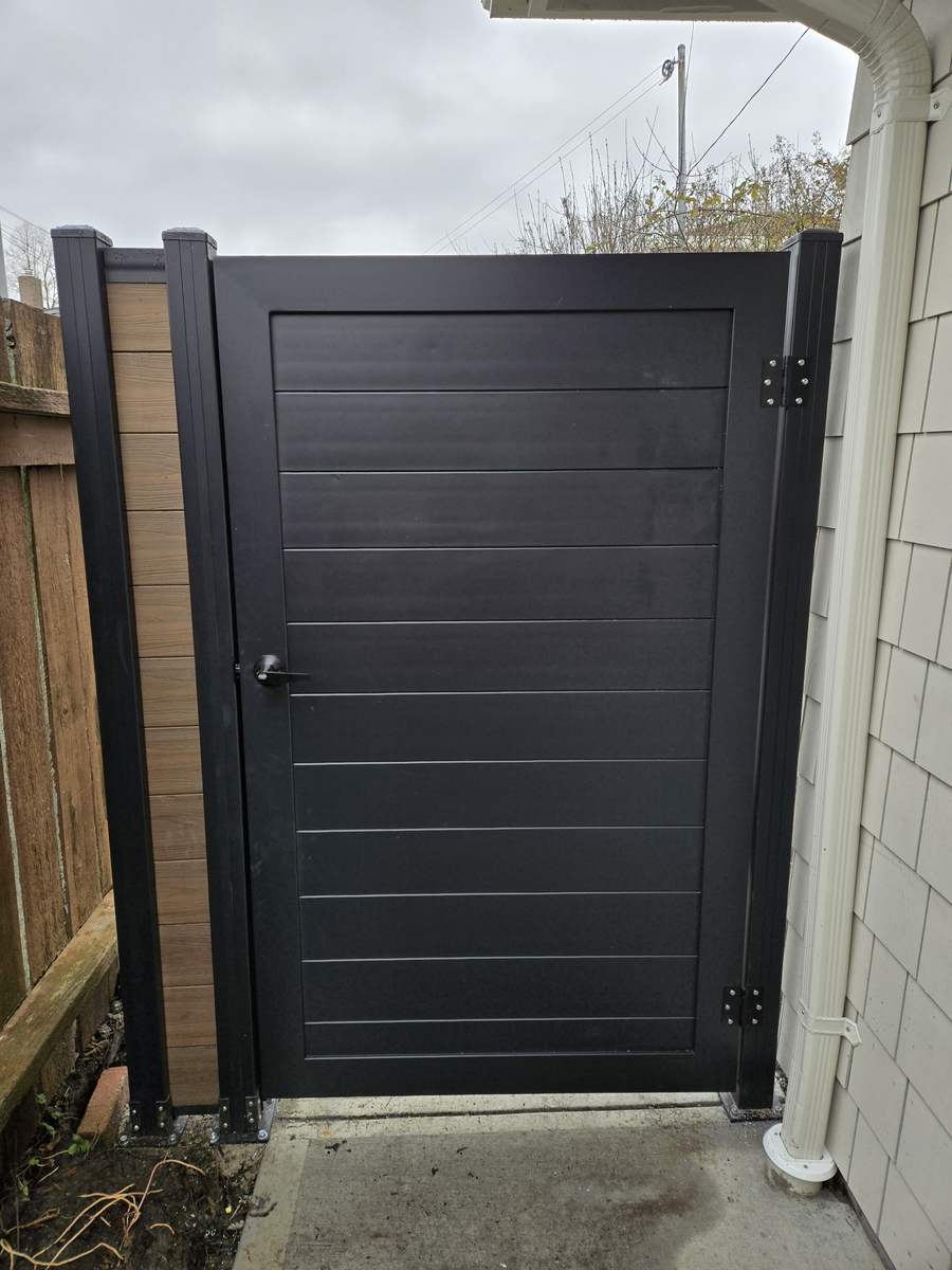 Dark charcoal composite gate with black aluminum frame
